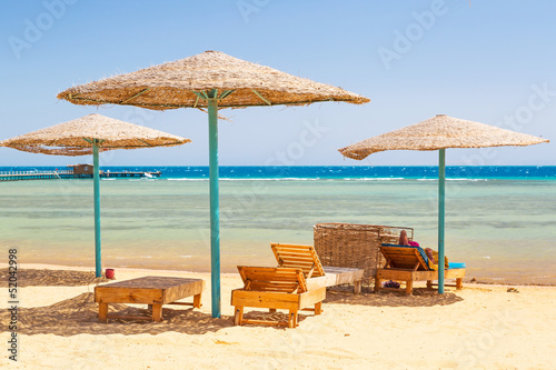 Relax under parasol on the beach of Red Sea  Egypt