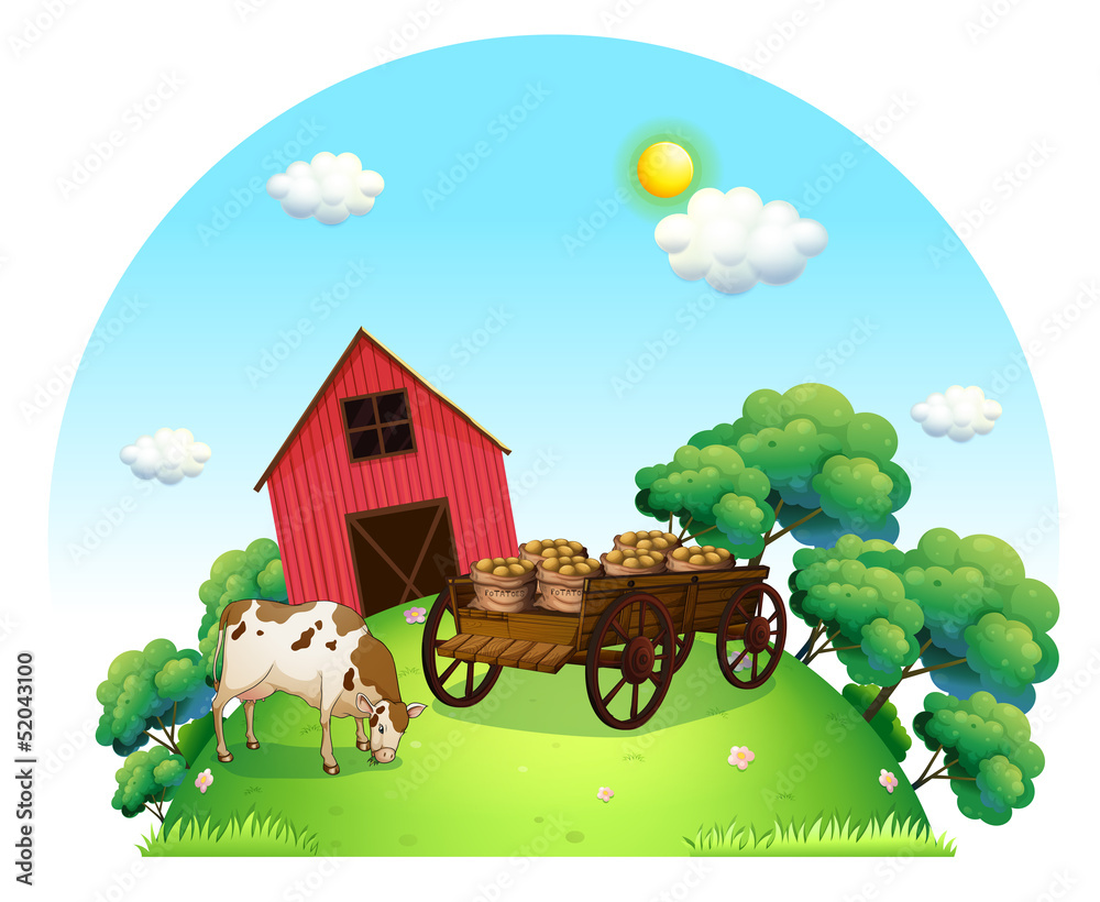 A cow and a carriage in front of a barn in the farm
