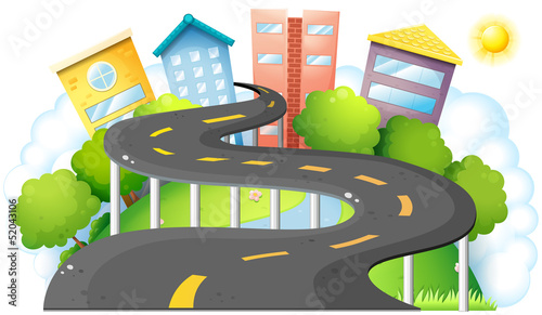 A curve road going to the city with high buildings