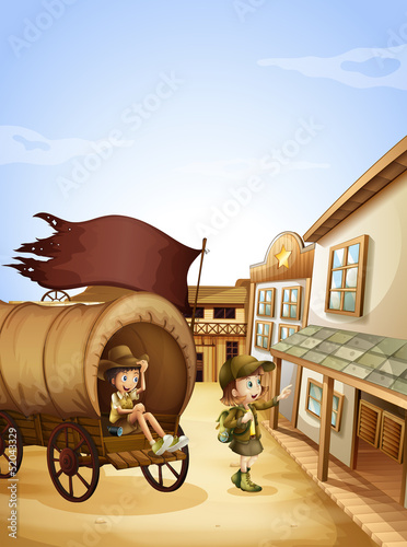 Two kids near the wagon