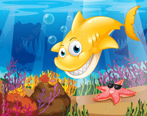 A yellow shark under the sea with starfish and corals