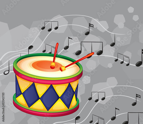 A drum with musical notes