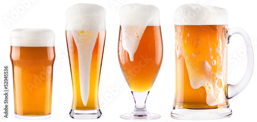 Frosty fresh beer collection with foam isolated
