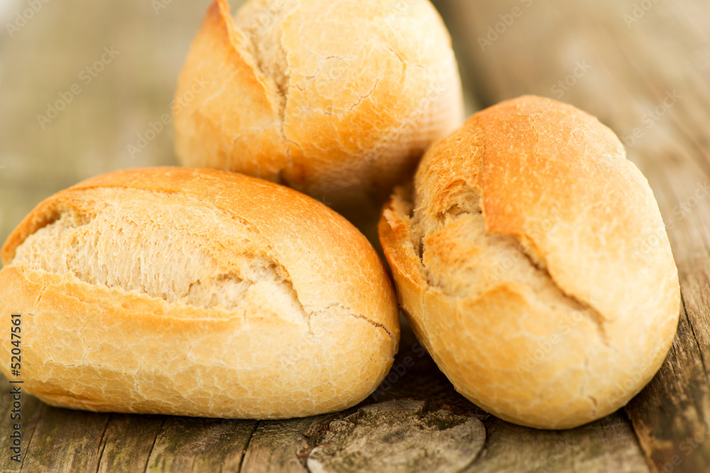Homemade bread on wooden table close up