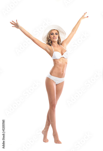 Young, slim, healthy and beautiful woman in a swimsuit