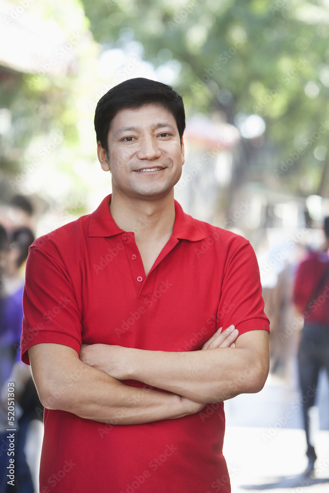 Fototapeta premium Portrait of Mid Adult Man in Nanluoguxiang, Beijing