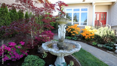 Water Fountain in Colorful Frontyard Spring Season 1080p photo