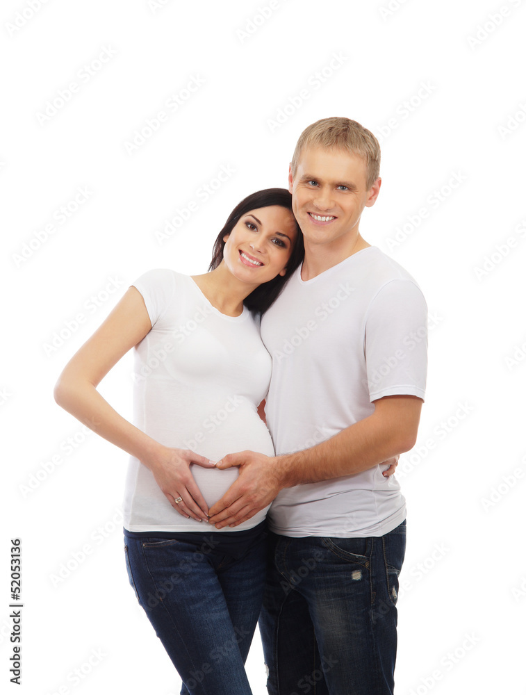 A young and attractive couple: pregnant mother and happy father