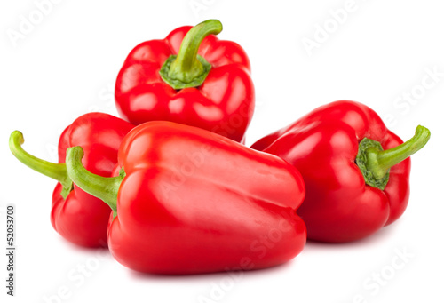 Four red sweet peppers