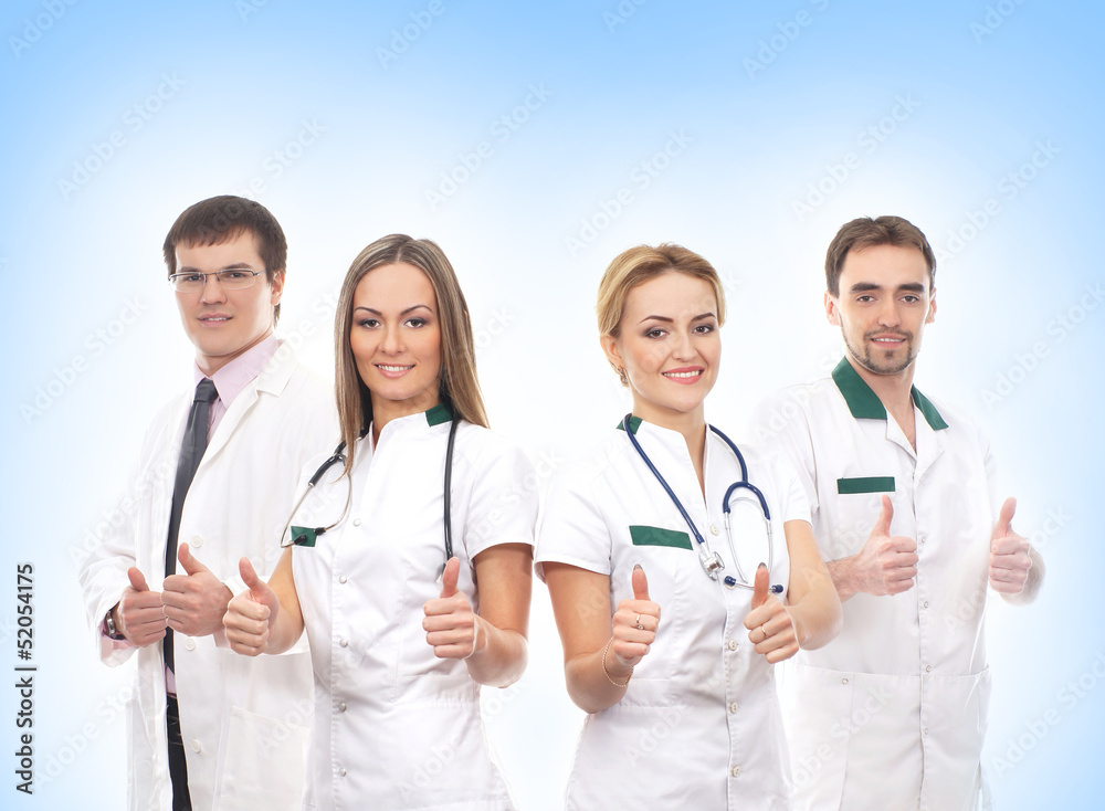 A team of young and smart medical workers in white clothes A team of young and smart medical workers in white clothes
