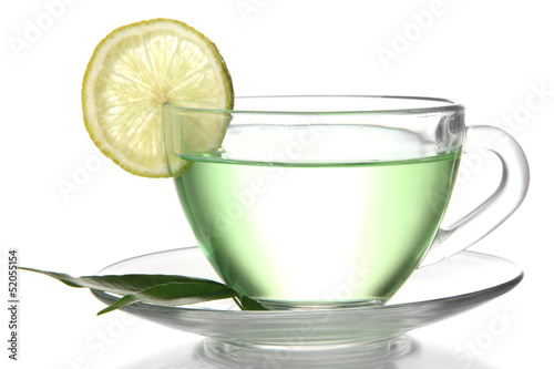Transparent cup of green tea with lemon, isolated on white