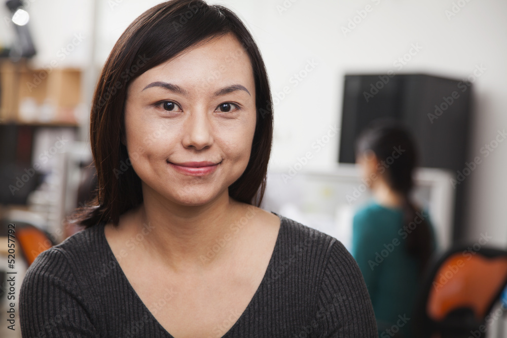 Portrait of mid adult businesswoman in the office Portrait of mid adult businesswoman in the office