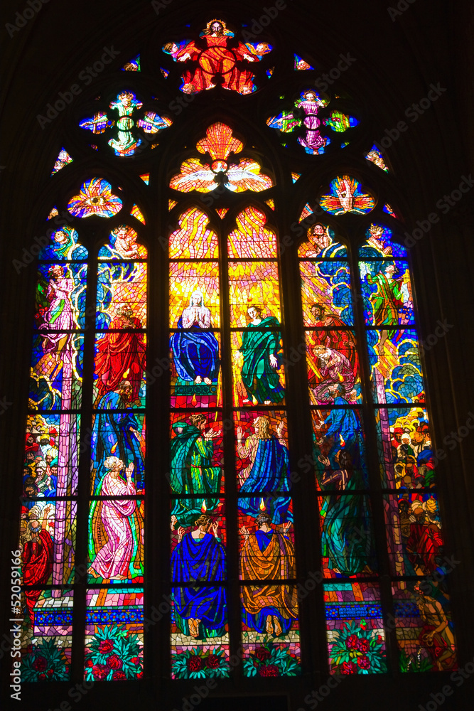 Stained glass windows of St. Vitus in Prague, Czech Republic.