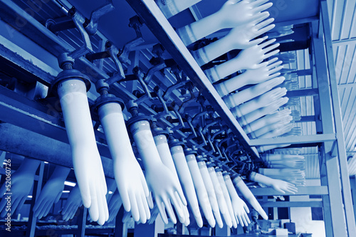 acrylonitrile butadiene gloves production line in a factory photo