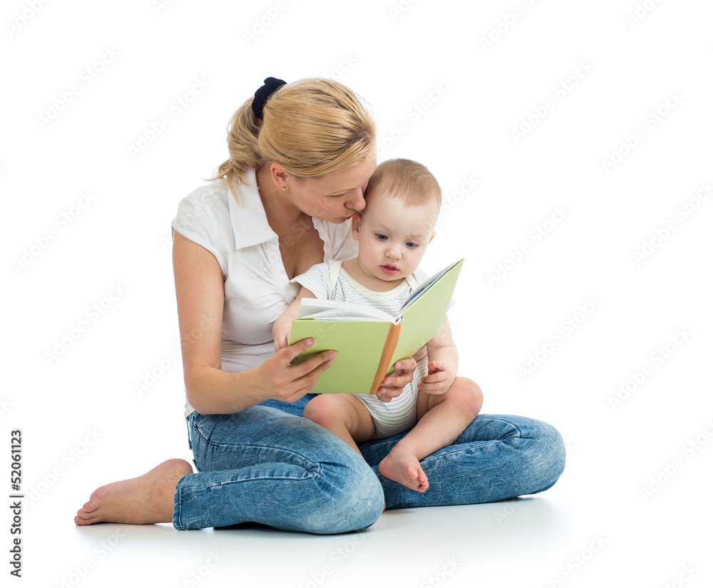 mother reading a book to her baby boy mother reading a book to her baby boy