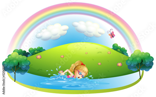 A girl swimming at the beach