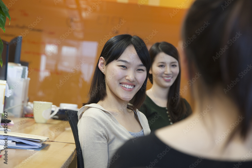 Businesswomen Having Meeting in the Office Businesswomen Having Meeting in the Office