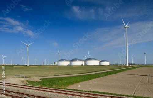 Oil storage and windturbines photo