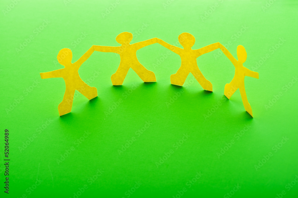 Paper people in teamworking concept Paper people in teamworking concept