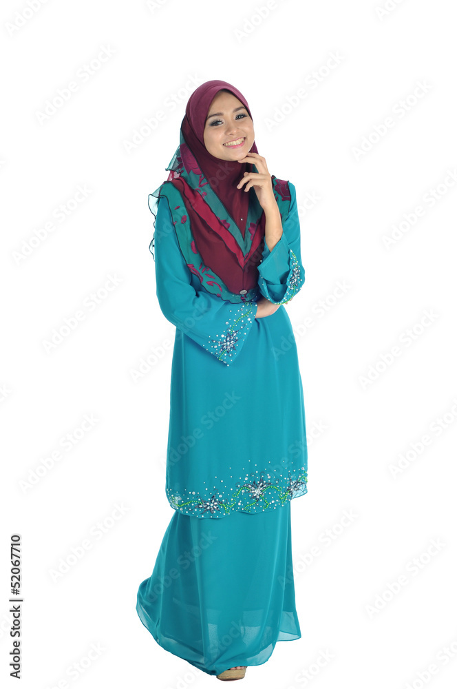 Young Muslim woman in head scarf with modern clothes, isolated on white Young Muslim woman in head scarf with modern clothes, isolated on white