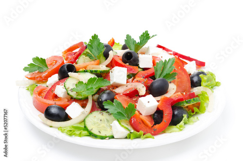 Greek salad with feta cheese, olives and vegetables, isolated