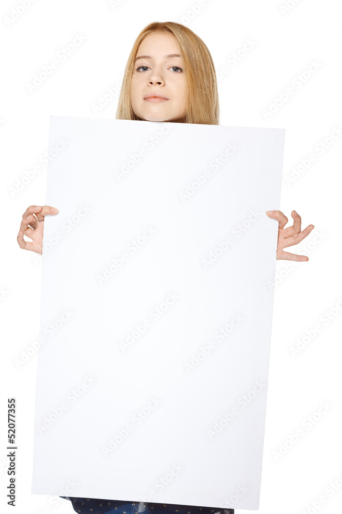 teenage girl holding peeking out the edge of blank banner teenage girl holding peeking out the edge of blank banner
