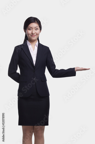 Young Businesswoman With Hand Out