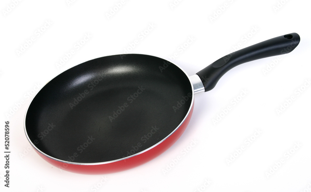 frying pan over white frying pan over white