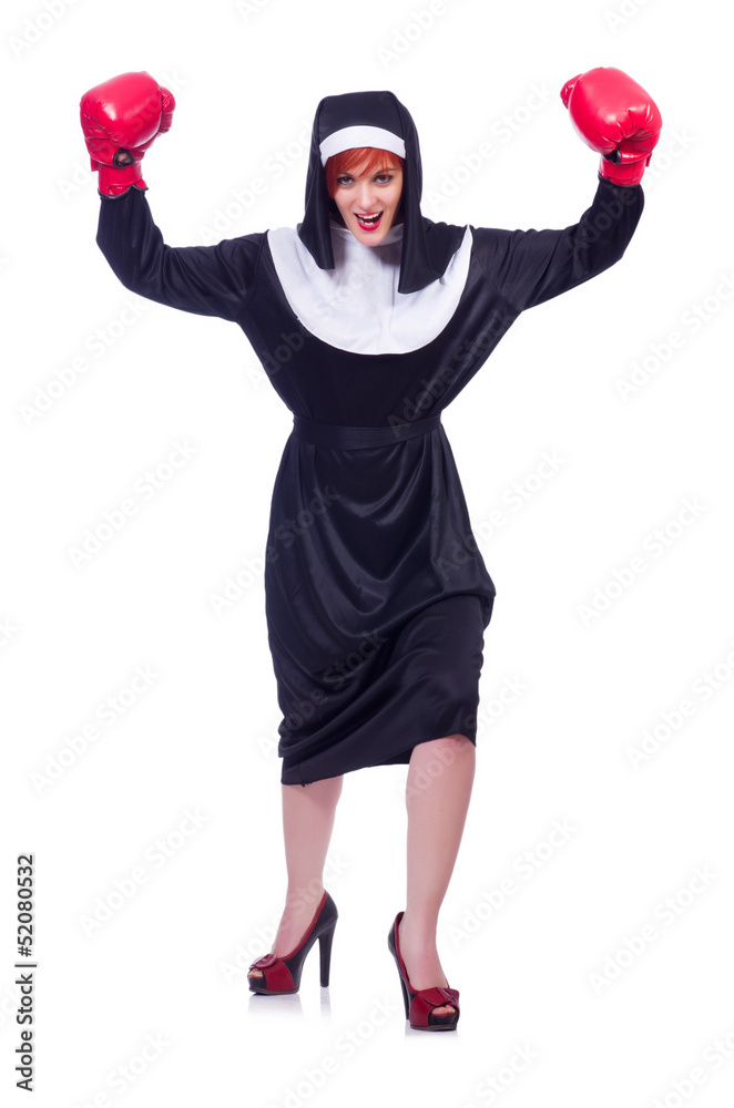 Nun with boxing gloves isolated on white Nun with boxing gloves isolated on white