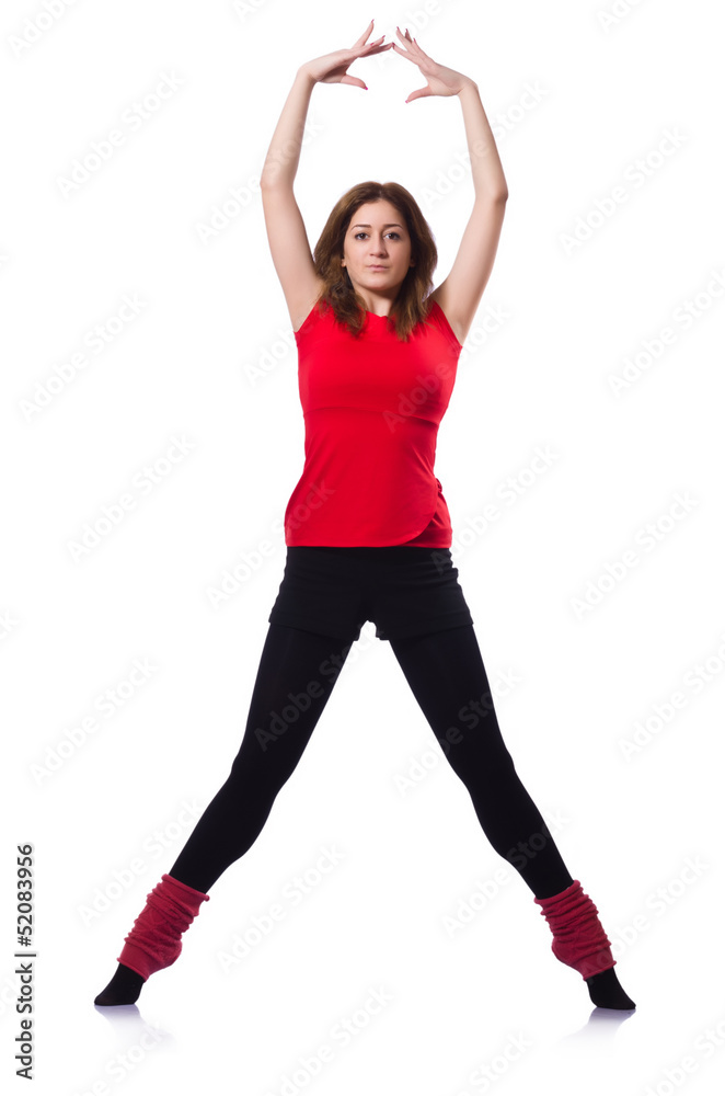 Young gymnast exercising on white