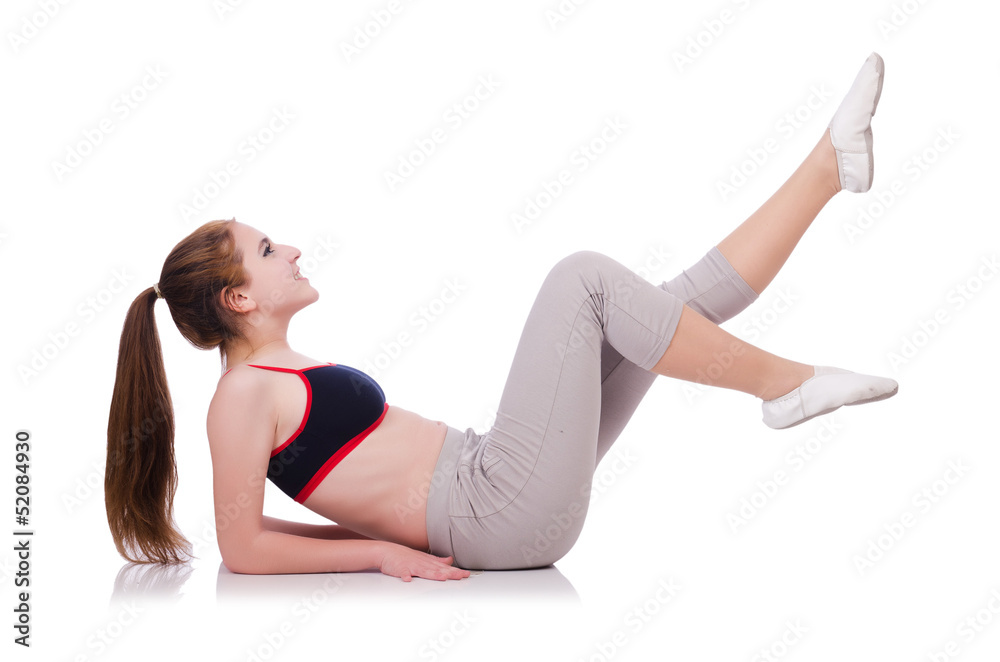 Young female doing exercises on white Young female doing exercises on white
