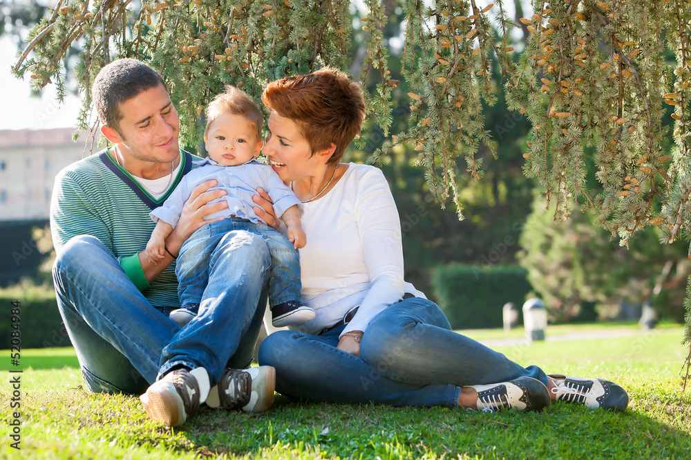 Family playing on grass Family playing on grass