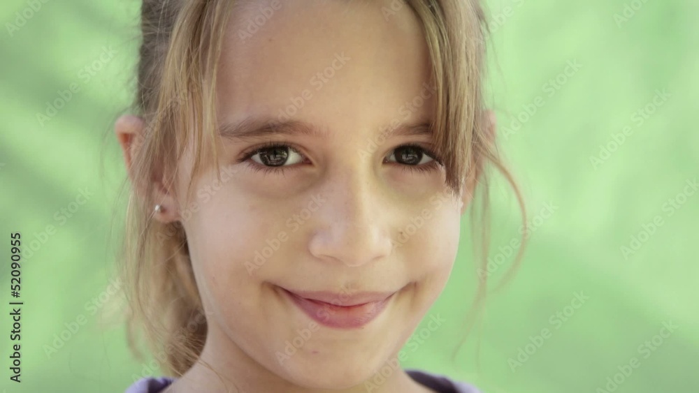 Portrait of happy young caucasian girl looking at camera Portrait of happy young caucasian girl looking at camera