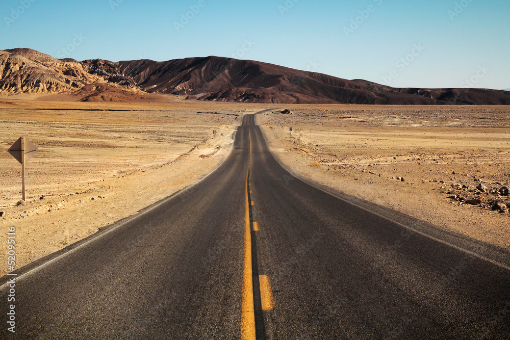 Desertic road to nowhere