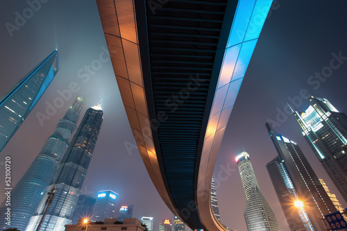 Photography pedestrian bridge with shanghai skyline at night