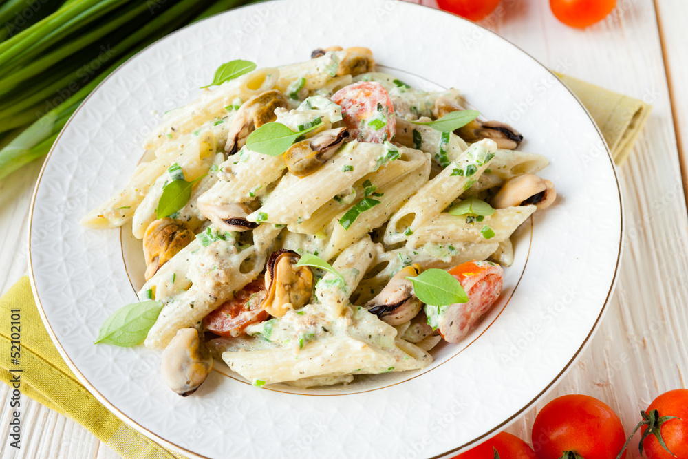 Pasta with mussels on a plate