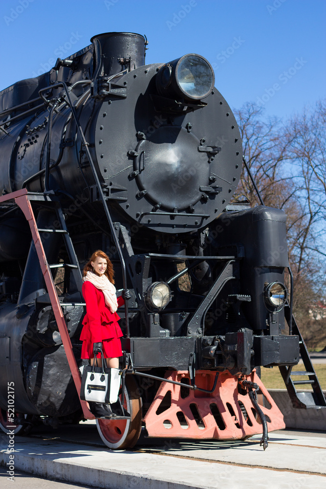Fototapeta premium beautiful woman and vintage train
