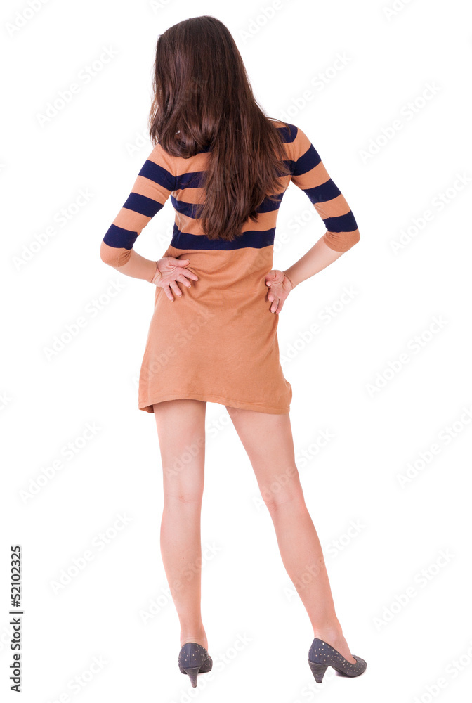 back view of standing young beautiful brunette woman back view of standing young beautiful brunette woman