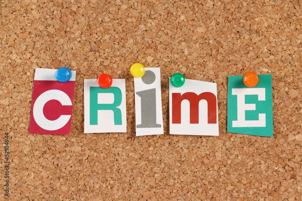 The word Crime in cut out magazine letters The word Crime in cut out magazine letters