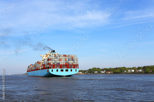 Containerschiff auf der Elbe photo