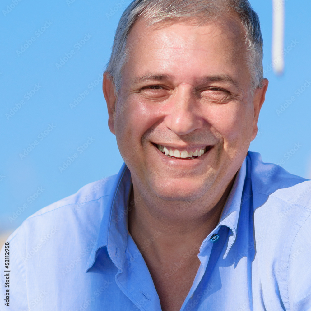 Close-up Of Happy Smiling Mature Man Close-up Of Happy Smiling Mature Man