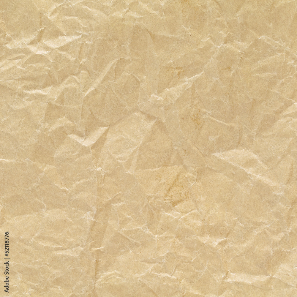 Fototapeta premium light brown crumpled recycled paper texture background