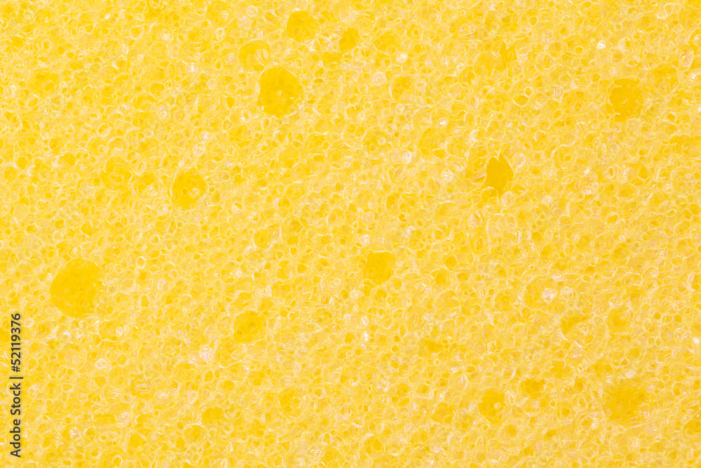 close up shot of yellow sponge texture background