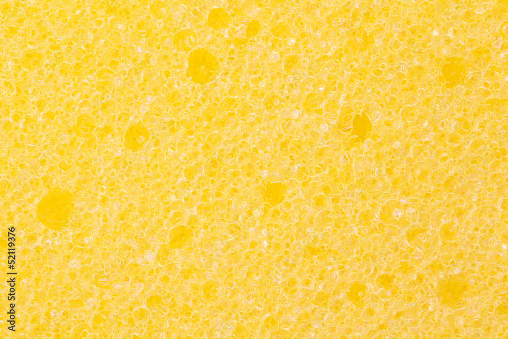 close up shot of yellow sponge texture background