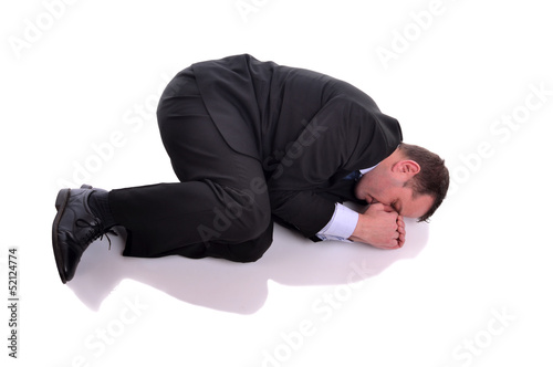 Photo businessman in fetal position