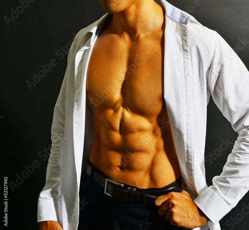 Muscular asian businessman