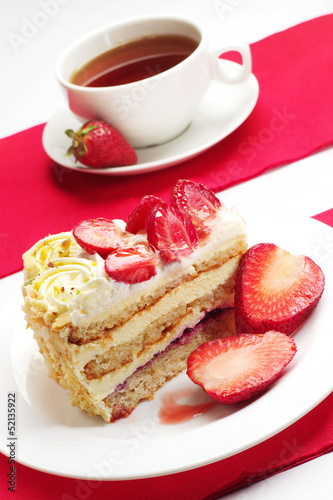 Strawberry cake and cup of tea