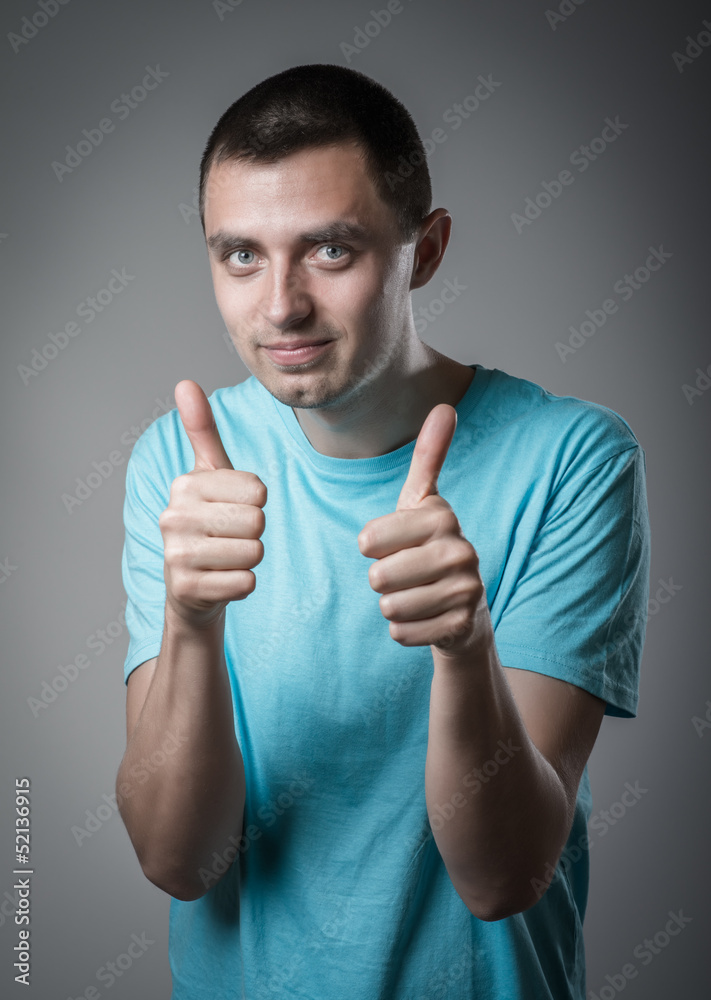 young man thumbs up young man thumbs up