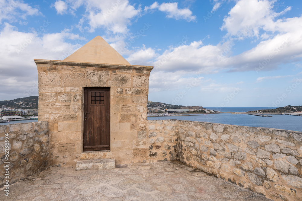Ibiza watchtower with Eivissa port view in Balearic islands