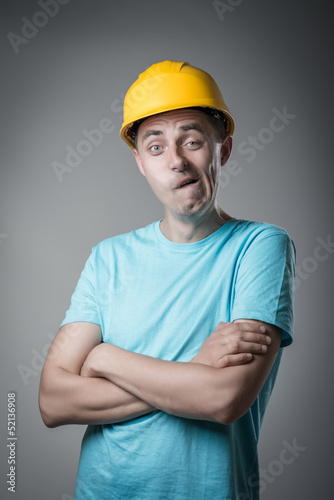 Fotografie worker in helmet resent